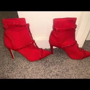 Red Jessica simpson booties with spikes size 6.5us